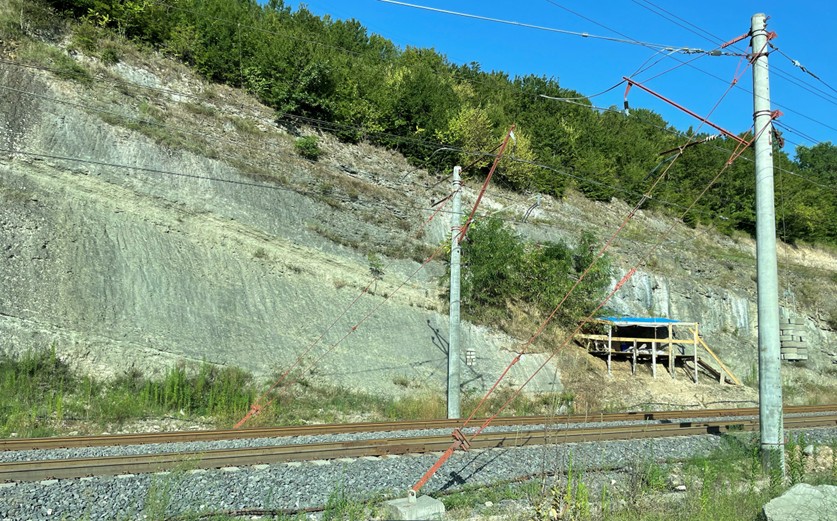  Schematic view of the site as seen in section. The shading shows area of the cave sediments in the cliff face